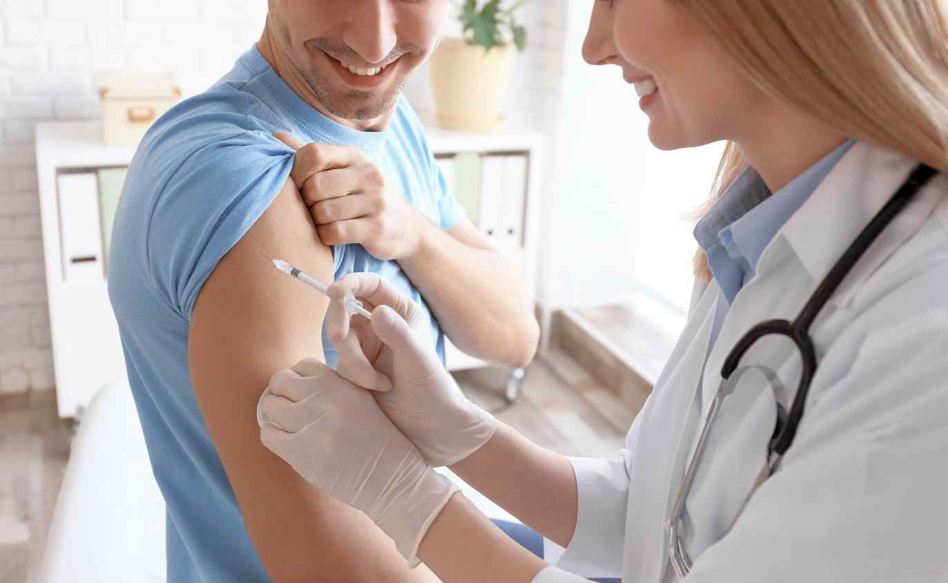 Doctor giving shot