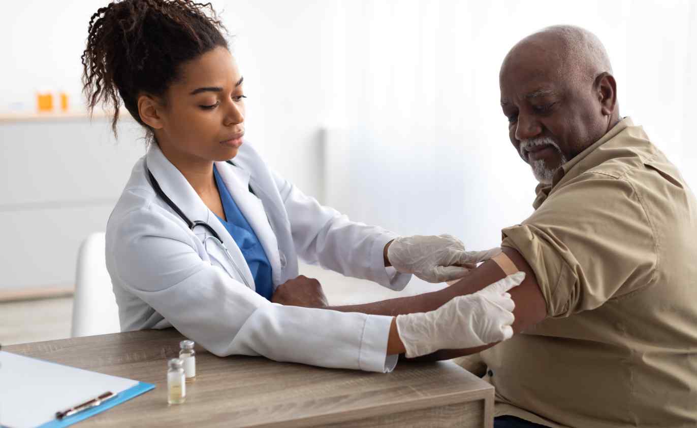 Doctor giving shot